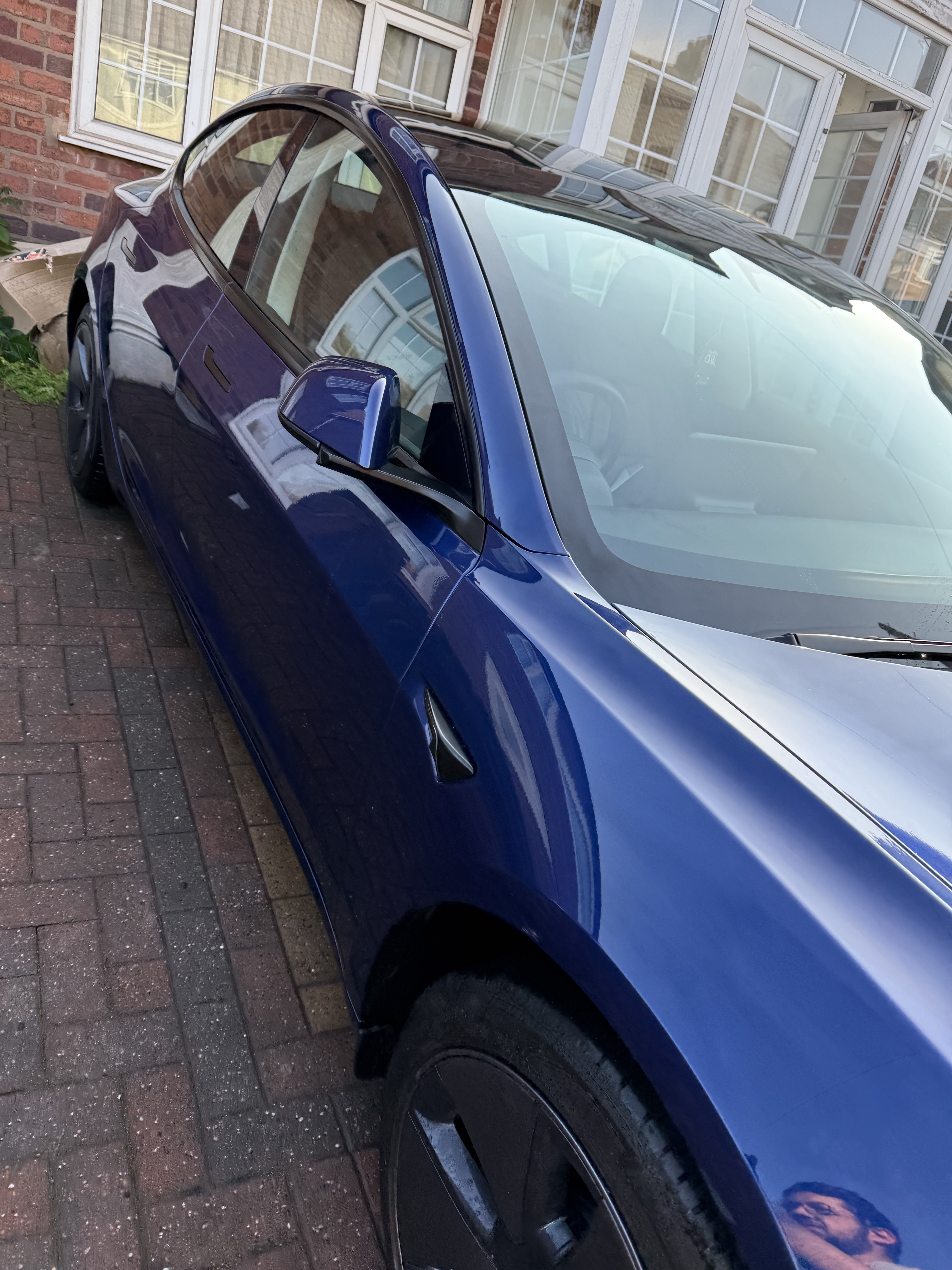 Blue Tesla with restored gloss